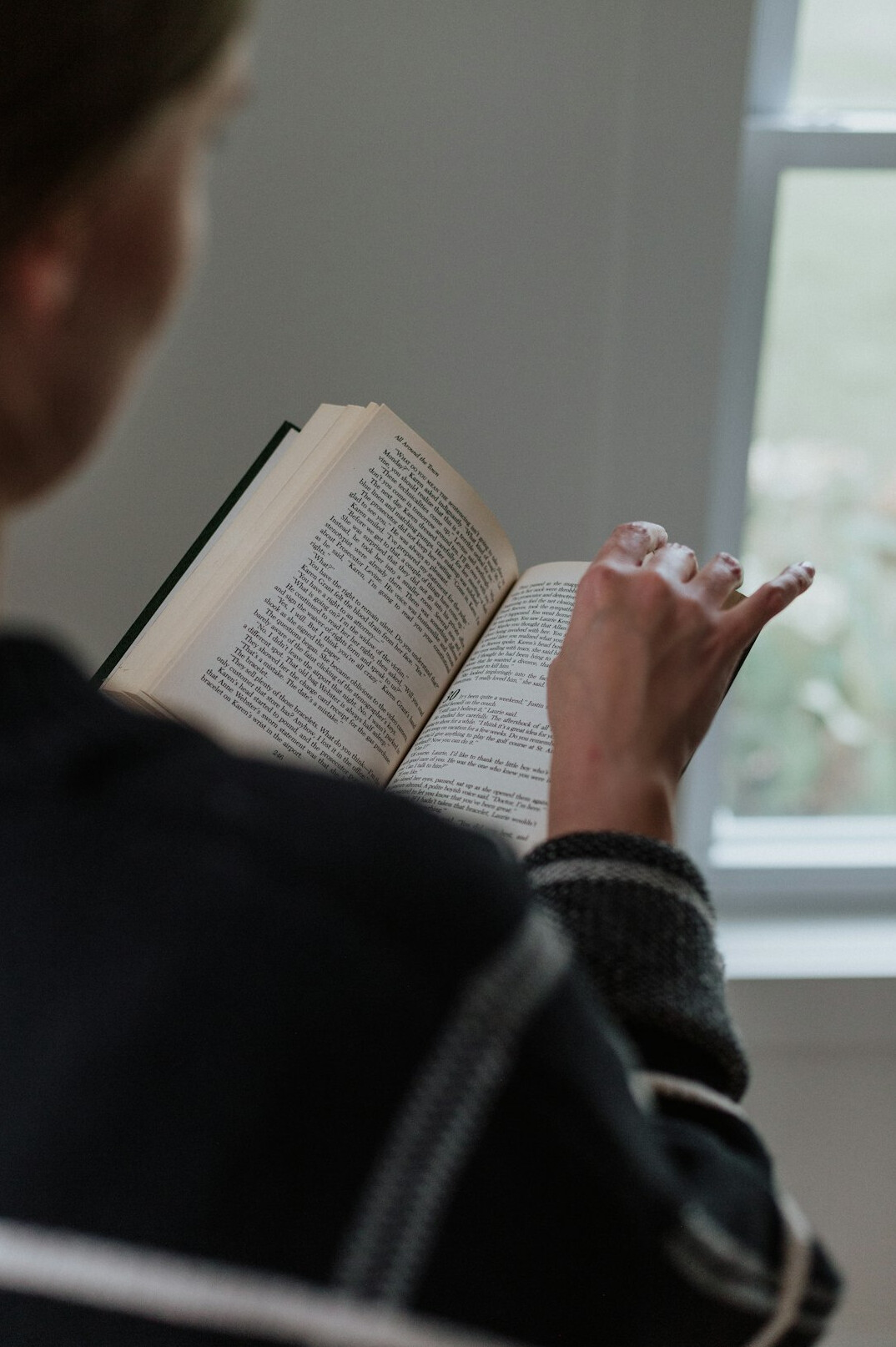 reader engaged with book