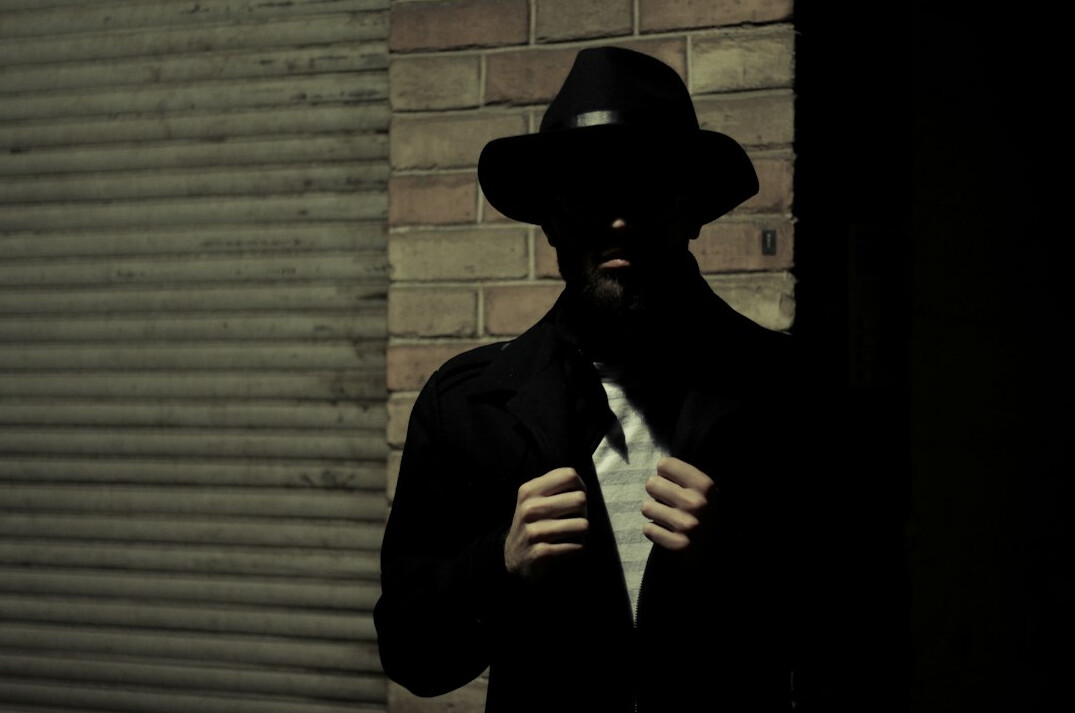 mysterious man in shadow